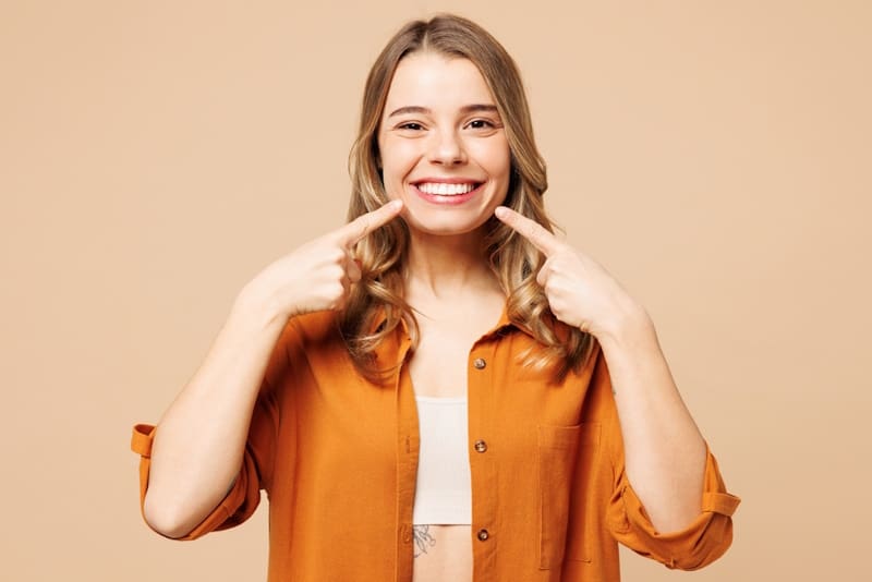 Woman smiling — Florida Blue dental insurance plans for 2026