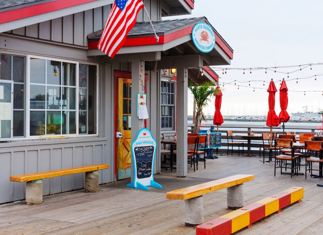 Restaurant Insurance - Fun, Coastal-Themed Seafood Restaurant with Outdoor Dining Overlooking the Ocean