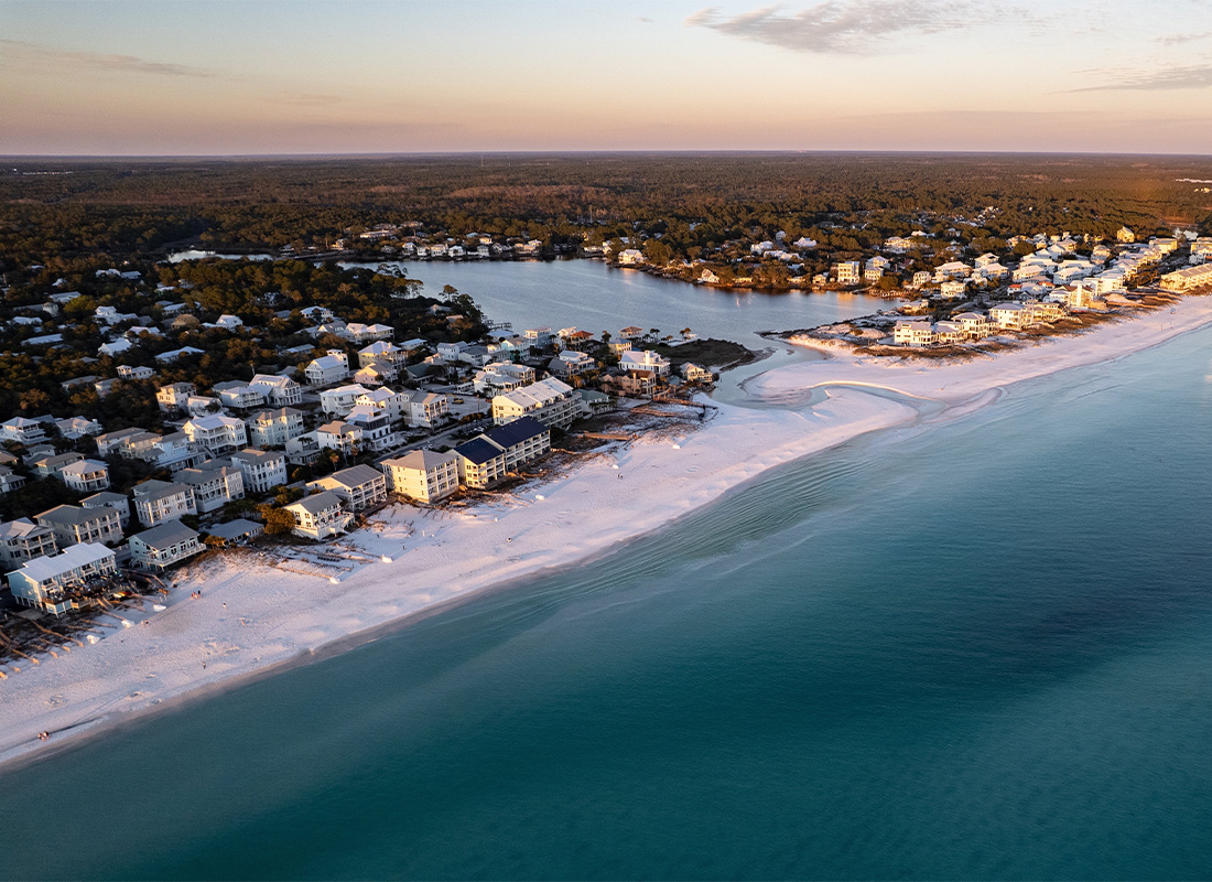Landlord and Rental Property Insurance - Aerial View of Homes Along the Beach at Eastern Lake on Florida's 30A at Sunset